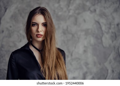 Young Woman Looking Straight Forward. Photo With Place For Text.