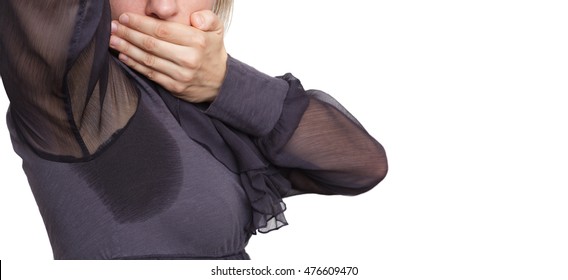 Young Woman Looking At The Sweaty Shirt