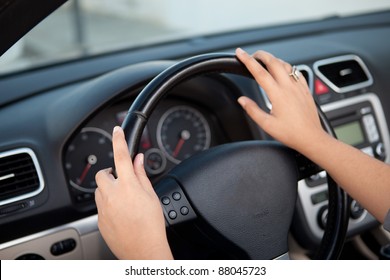 Young Woman In Luxury Sports Car