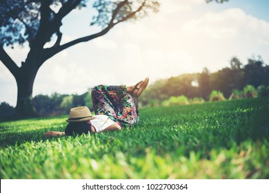 Young Woman Lying Down On Grass. Relax Time.