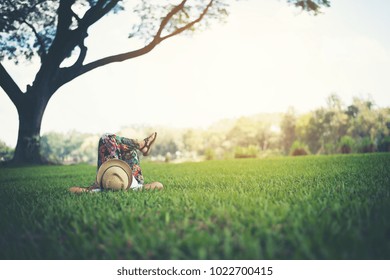 Young Woman Lying Down On Grass. Relax Time.