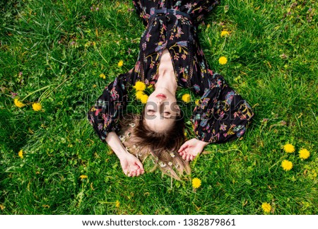 Similar – woman among daisies