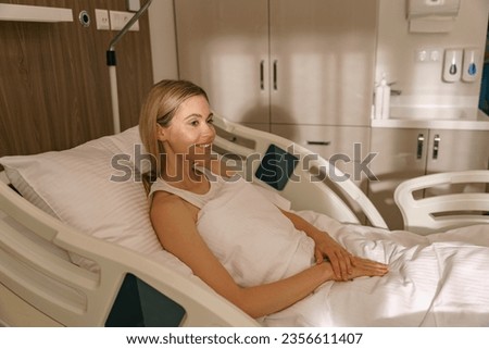 Similar – Image, Stock Photo Young woman resting after working out outdoors at sunset