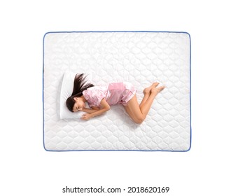 Young Woman Lying On Mattress Against White Background, Top View