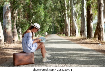 Young Woman Making Auto Stop At Travel