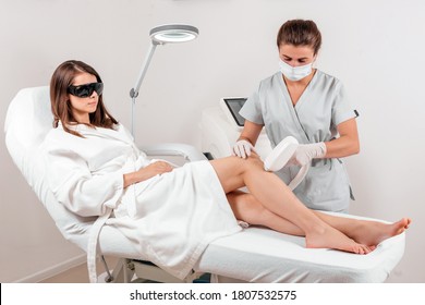 Young Woman Making Body Hair Removal Laser Depilation In Beauty Center