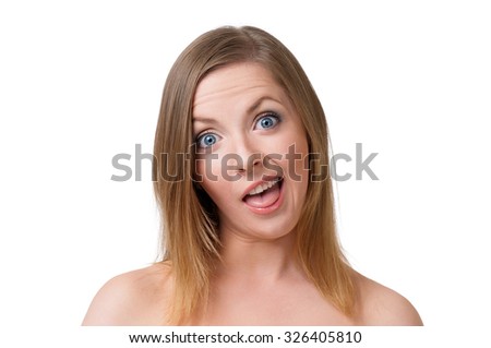Young woman making faces, isolated on white background
