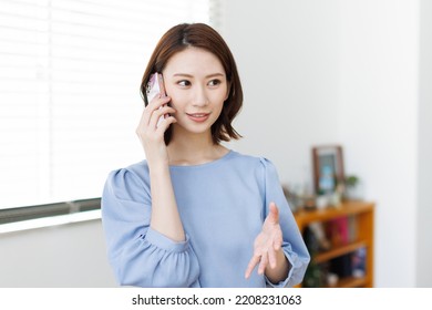 Young Woman Making Phone Call Stock Photo 2208231063 | Shutterstock