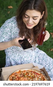 A Young Woman Making Pizza Photo, Picnic Concept.