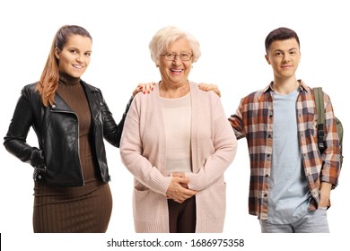 Young Woman And A Male Student Standing Next To An Older Lady Isolated On White Background