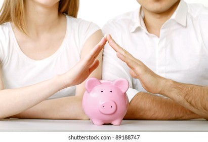 Young Woman And Man  With Piggy Bank (money Box), Isolated On White Background