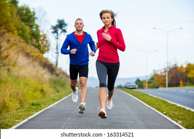 Young Woman And Man Running