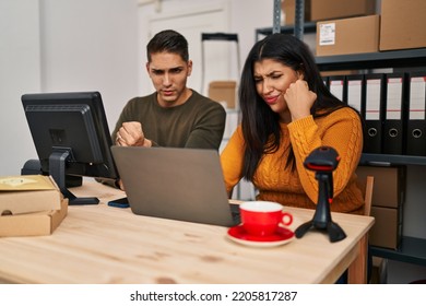 Young Woman And Man Working At Small Business Ecommerce Annoyed And Frustrated Shouting With Anger, Yelling Crazy With Anger And Hand Raised 