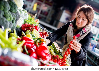 Young woman at the market - Powered by Shutterstock