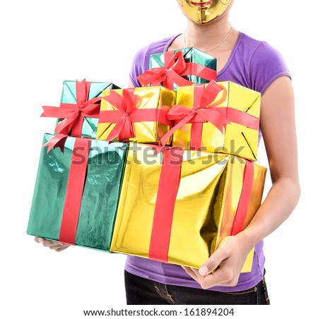 young woman with a mask carrying a lot of gifts, isolated on white background