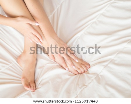 Similar – Image, Stock Photo legs Bed Feminine