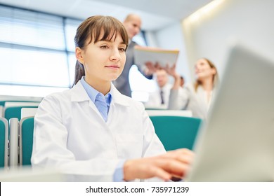 Young Woman As Medicine Student With Laptop Learn In Apprenticeship