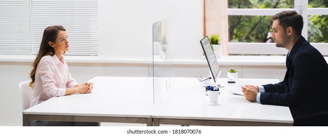 Young Woman Meeting Consultant Or Lawyer With Face Masks - Powered by Shutterstock