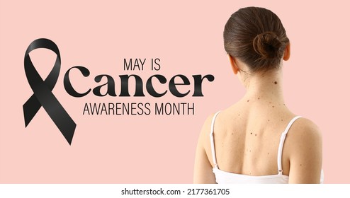 Young woman with moles, black ribbon and text MAY IS CANCER AWARENESS MONTH on pink background
