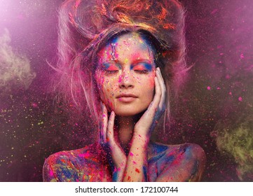 Young woman muse with creative body art and hairdo 
