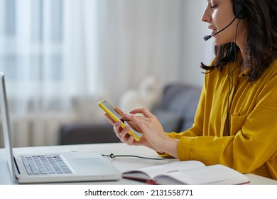 Young Woman In A Mustard Shirt Looking Busy