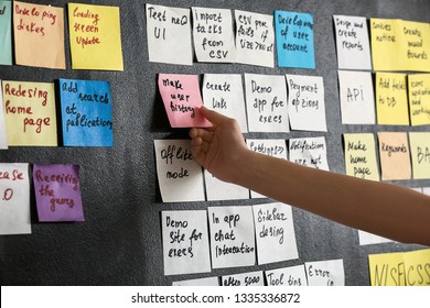 Young Woman Near Scrum Task Board In Office