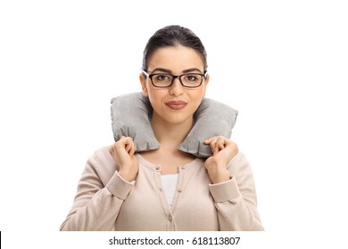 Young Woman With A Neck Pillow Isolated On White Background