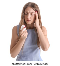 Young Woman With Nosebleed And Tissue On White Background