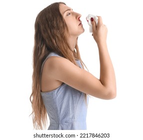 Young Woman With Nosebleed And Tissue On White Background