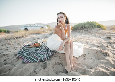 Young Woman On The Beach In The Evening, Picnic On The Beach, Car In The Background