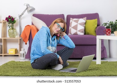 Young Woman On The Floor With Lap Top Computer