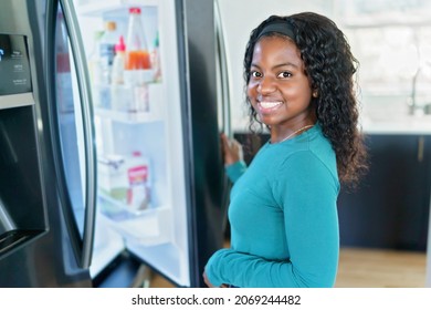 746 Black woman fridge Stock Photos, Images & Photography | Shutterstock