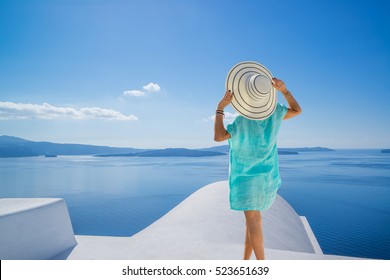 Young woman on holidays, Santorini Oia town Greece