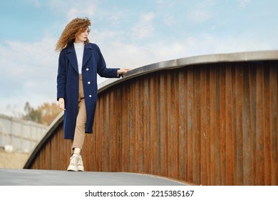 Young Woman On Rusty Foot Bridge