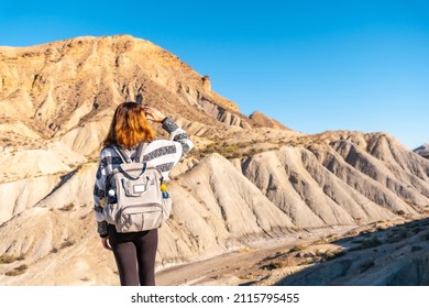 A Young Woman On A Trek In The Las Salinas Ravine In The Tabernas Desert, Almería Province, Andalusia