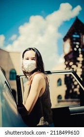 Young Woman Open Car Door And Prepare To Enter The Car