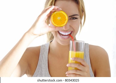 Young Woman With Orange Juice