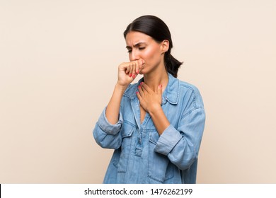Young woman over isolated background is suffering with cough and feeling bad - Shutterstock ID 1476262199