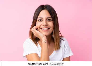 Young woman over isolated pink background - Shutterstock ID 1656009124