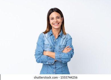 Young woman over isolated white background keeping the arms crossed in frontal position - Shutterstock ID 1555744256