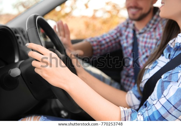 Young woman passing
driving license exam