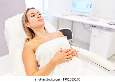 Young woman as a patient in the beauty clinic waiting for treatment or surgery - Shutterstock ID 1901885170