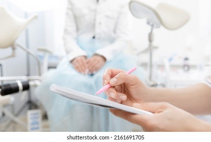 Young woman patient at gynecologist appointment consults in medical institution. - Shutterstock ID 2161691705