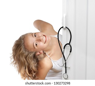 Young Woman Peeking Through Door