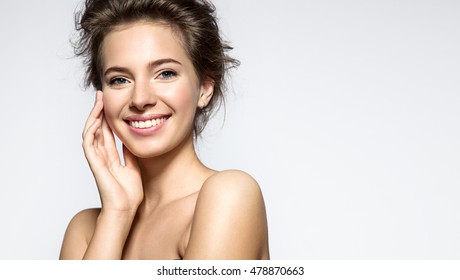 Young woman with perfect skin clean and white teeth