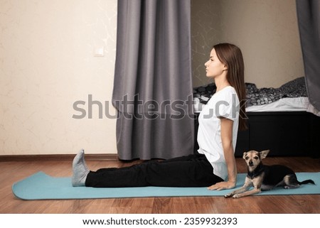 Young Woman and pet dog embracing a healthy and active lifestyle