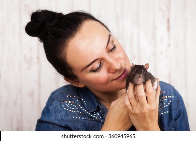 Young Woman With A Pet Rat