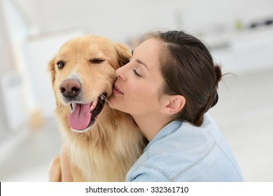 Young Woman Petting Her Dog