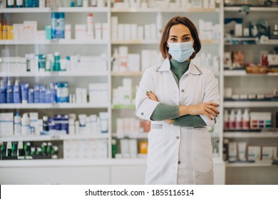 Young Woman Pharmacist At Pharmacy