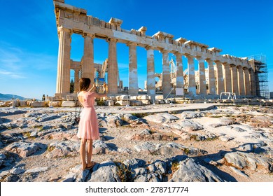 Young Woman Photographing With Digital Tablet Parthenon Temple In Acropolis